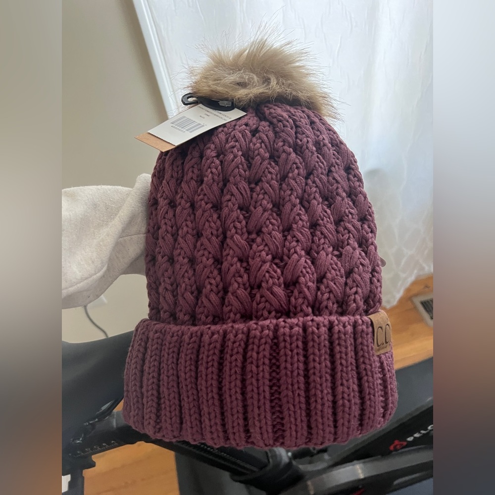 CC beanie fur lined with pom